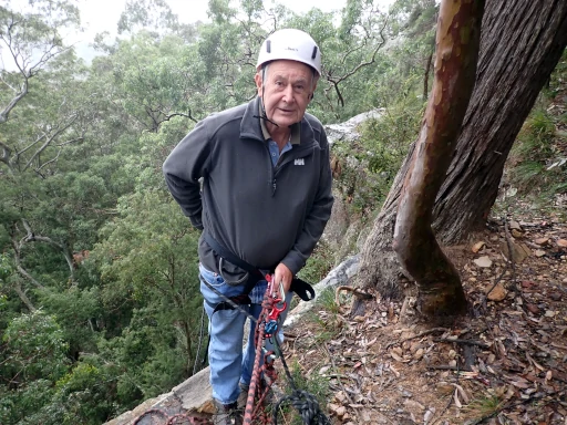 An elderly man is getting ready to abseil for the first time on his Hunter Valley Abseiling Adventure