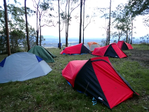 Tents are in a campsite that has magnificent valley views during a Gold Bushwalking Award Journey