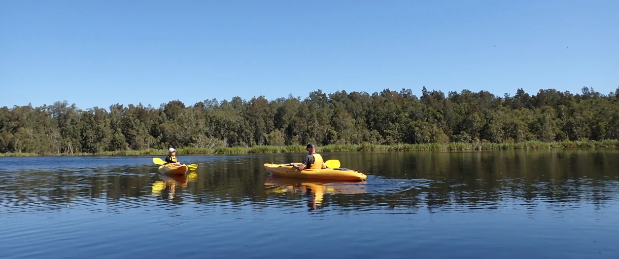 Two Kayaker are paddling across the lake during the Silver Kayaking Award Journey
