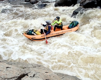Snowy River whitewater rafting journey is full of fun small rapids that these two people are rafting down