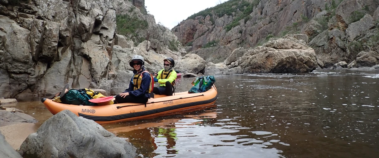two people sitting in a raft about to enter the Tulloch Ard Gorge Snowy River.
