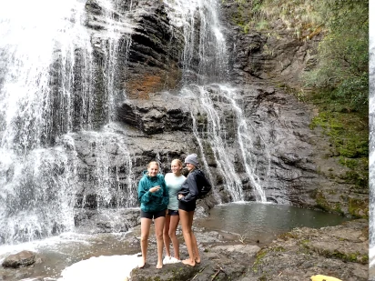 When rafting Tulloch Ard Gorge Snowy River there is lots to see and do these people are visiting a waterfall 